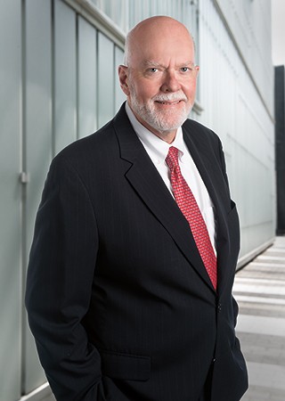 Charles E. Leche litigation attorney